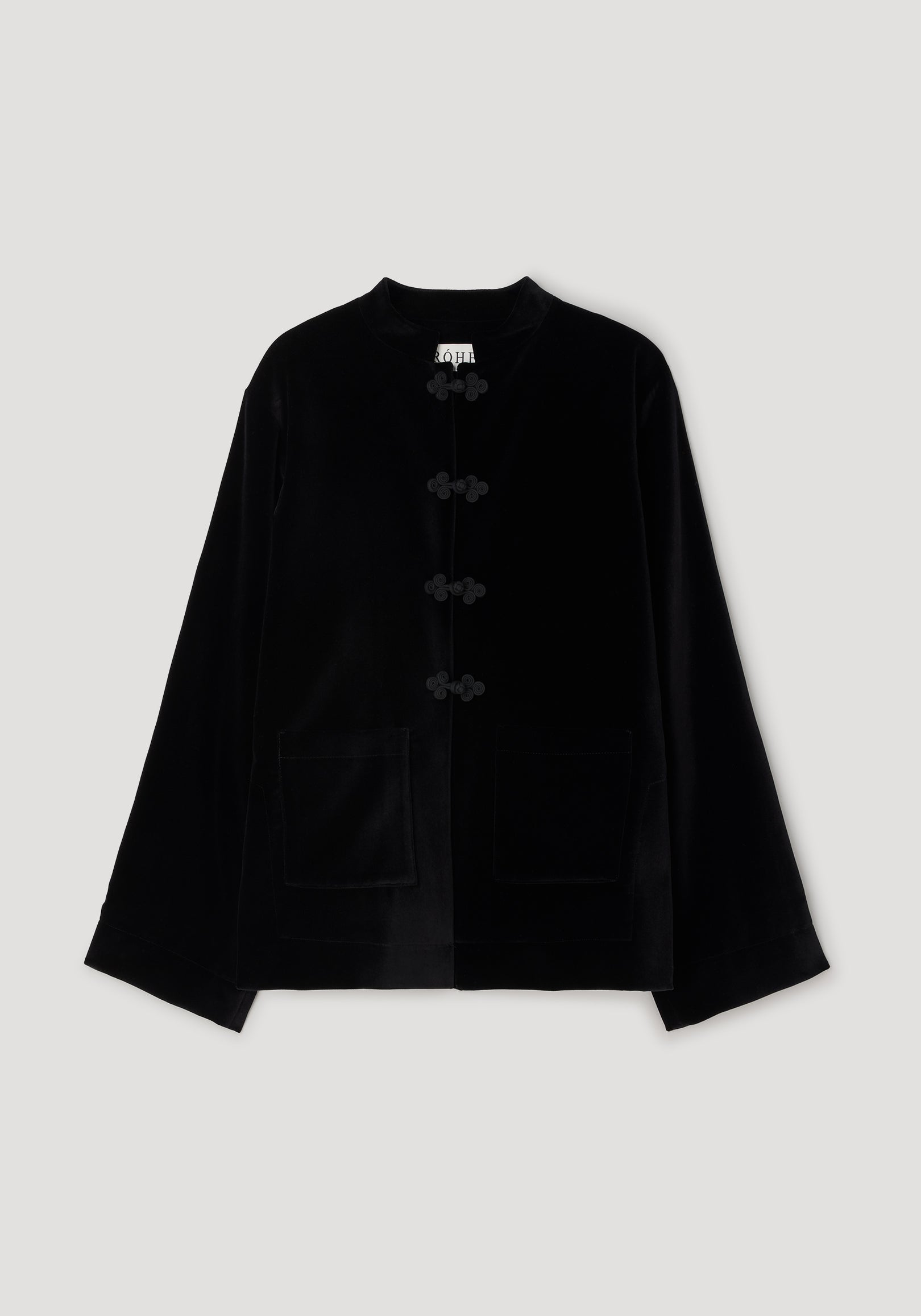 Pankou closure velvet jacket | black displayed flat, featuring a smooth velvet texture, traditional pankou button closures, long sleeves, a collarless neckline, and two front pockets on a neutral background.