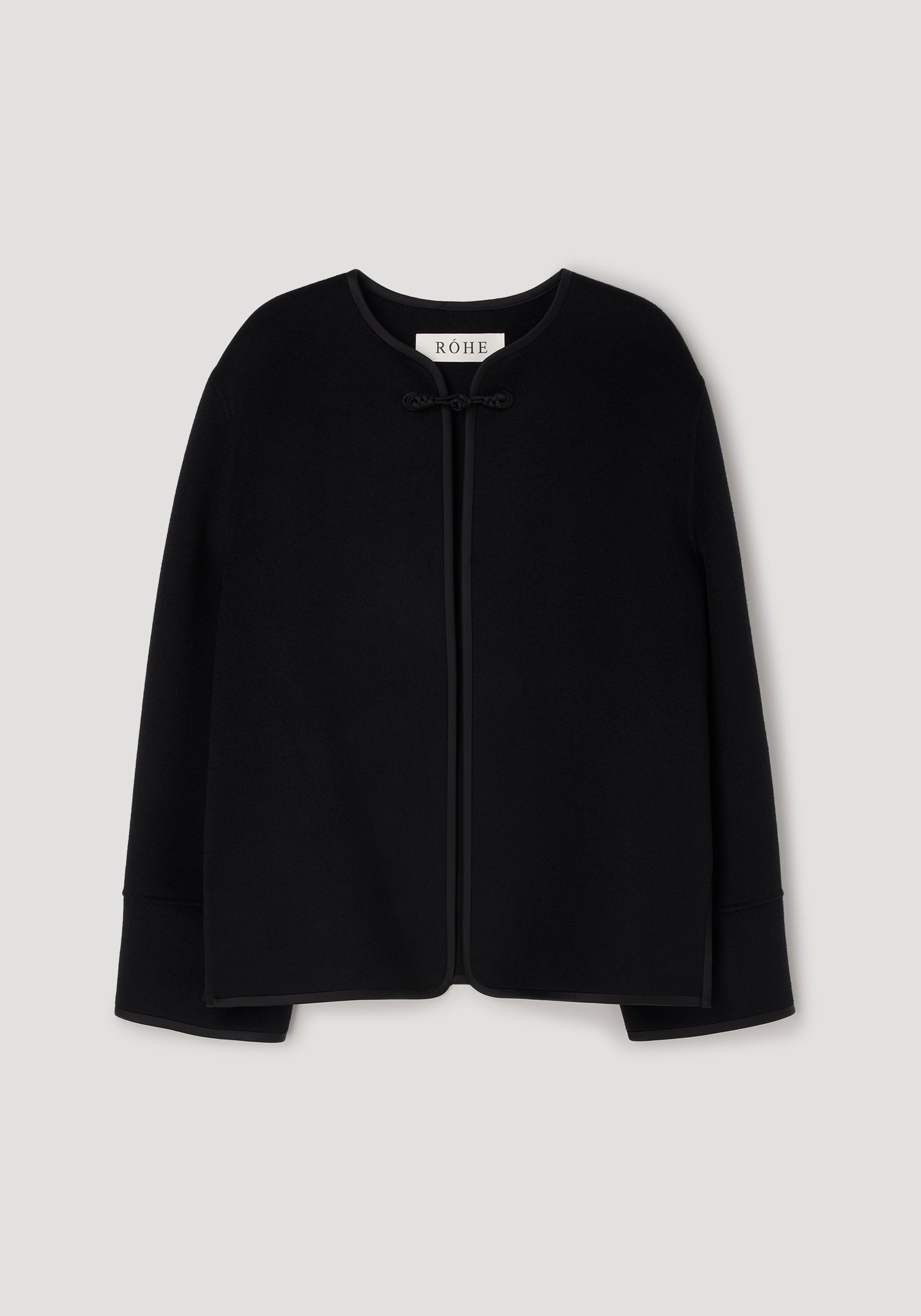 Black minimalist jacket with long sleeves and a rounded neckline, featuring a single pankou knot closure at the front, labeled Double-faced pankou jacket | black.