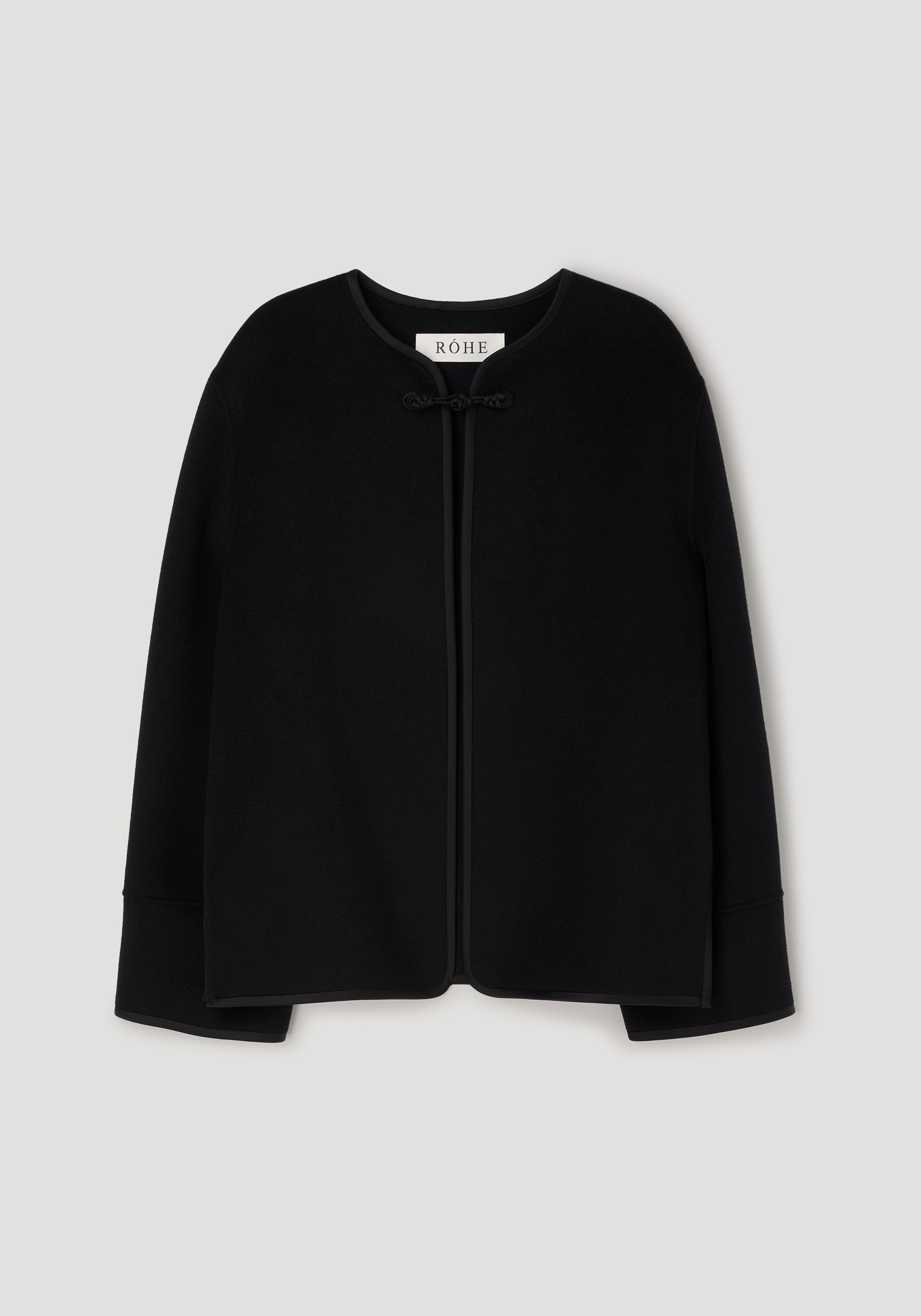 Black minimalist jacket with long sleeves and a rounded neckline, featuring a single pankou knot closure at the front, labeled Double-faced pankou jacket | black.