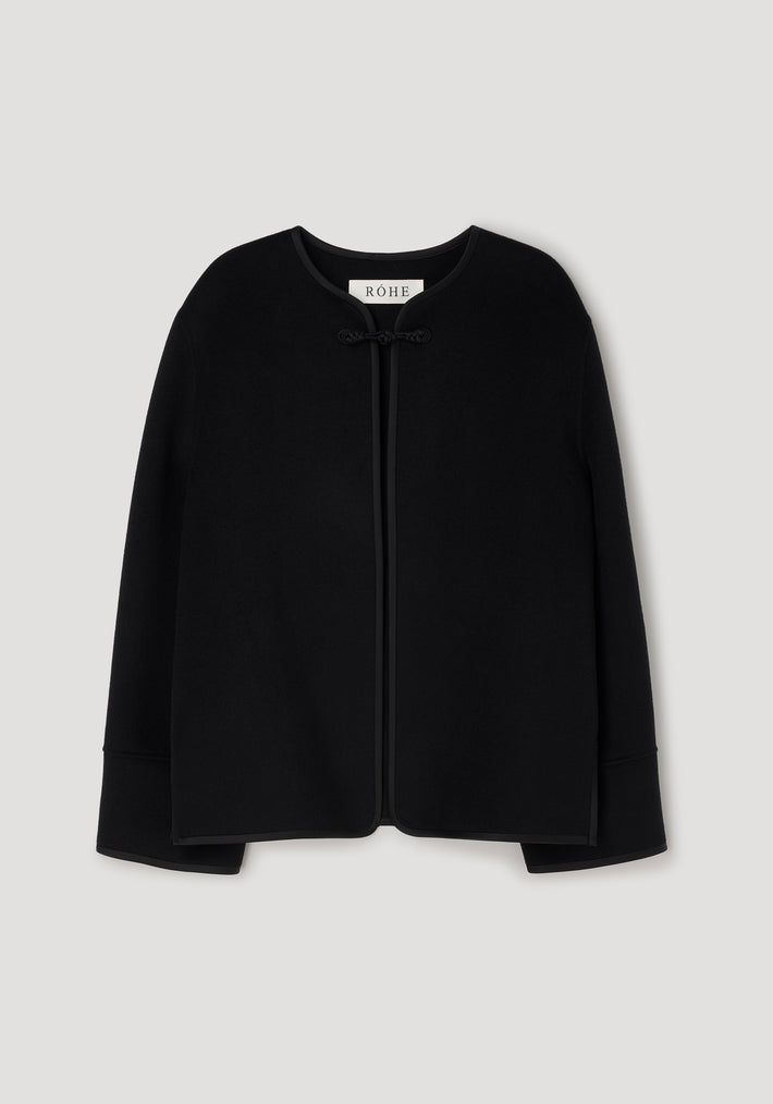 Black minimalist jacket with long sleeves and a rounded neckline, featuring a single pankou knot closure at the front, labeled Double-faced pankou jacket | black.