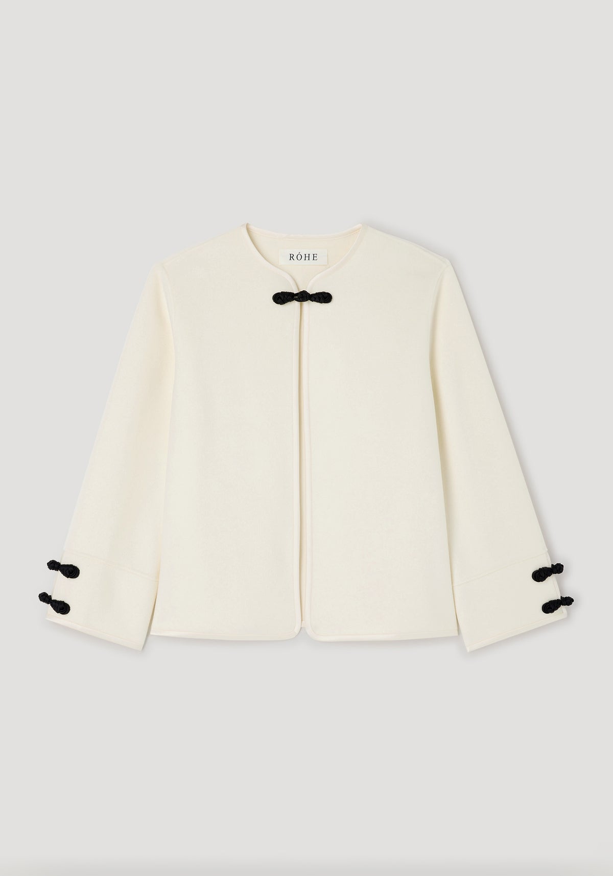 Double-faced pankou jacket | off white with black traditional pankou knot fastenings on the collar and sleeves, featuring a minimalist and elegant design.
