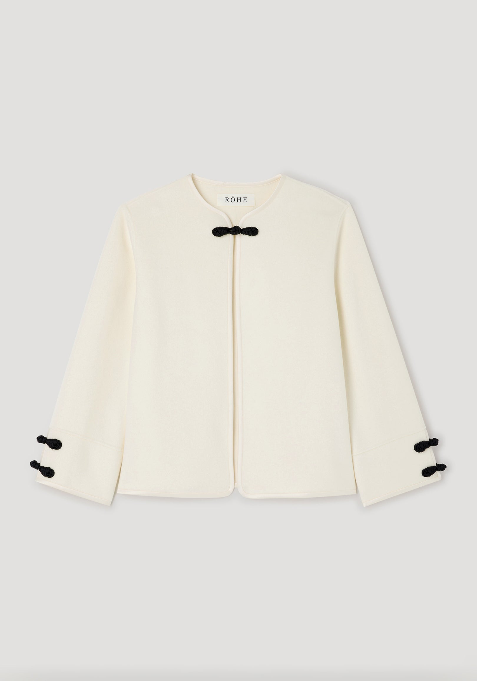 Double-faced pankou jacket | off white with black traditional pankou knot fastenings on the collar and sleeves, featuring a minimalist and elegant design.
