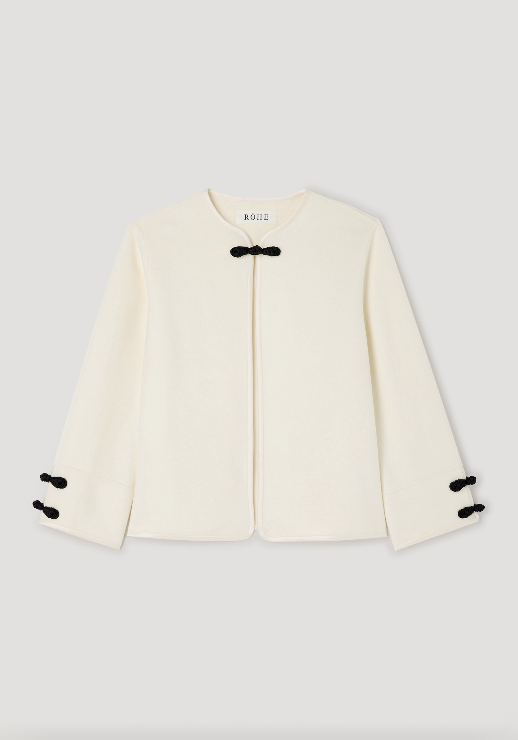 Double-faced pankou jacket | off white with black traditional pankou knot fastenings on the collar and sleeves, featuring a minimalist and elegant design.