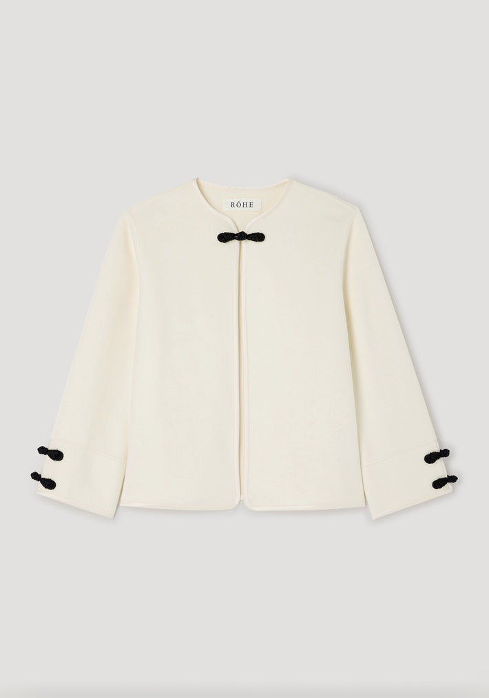 Double-faced pankou jacket | off white with black traditional pankou knot fastenings on the collar and sleeves, featuring a minimalist and elegant design.