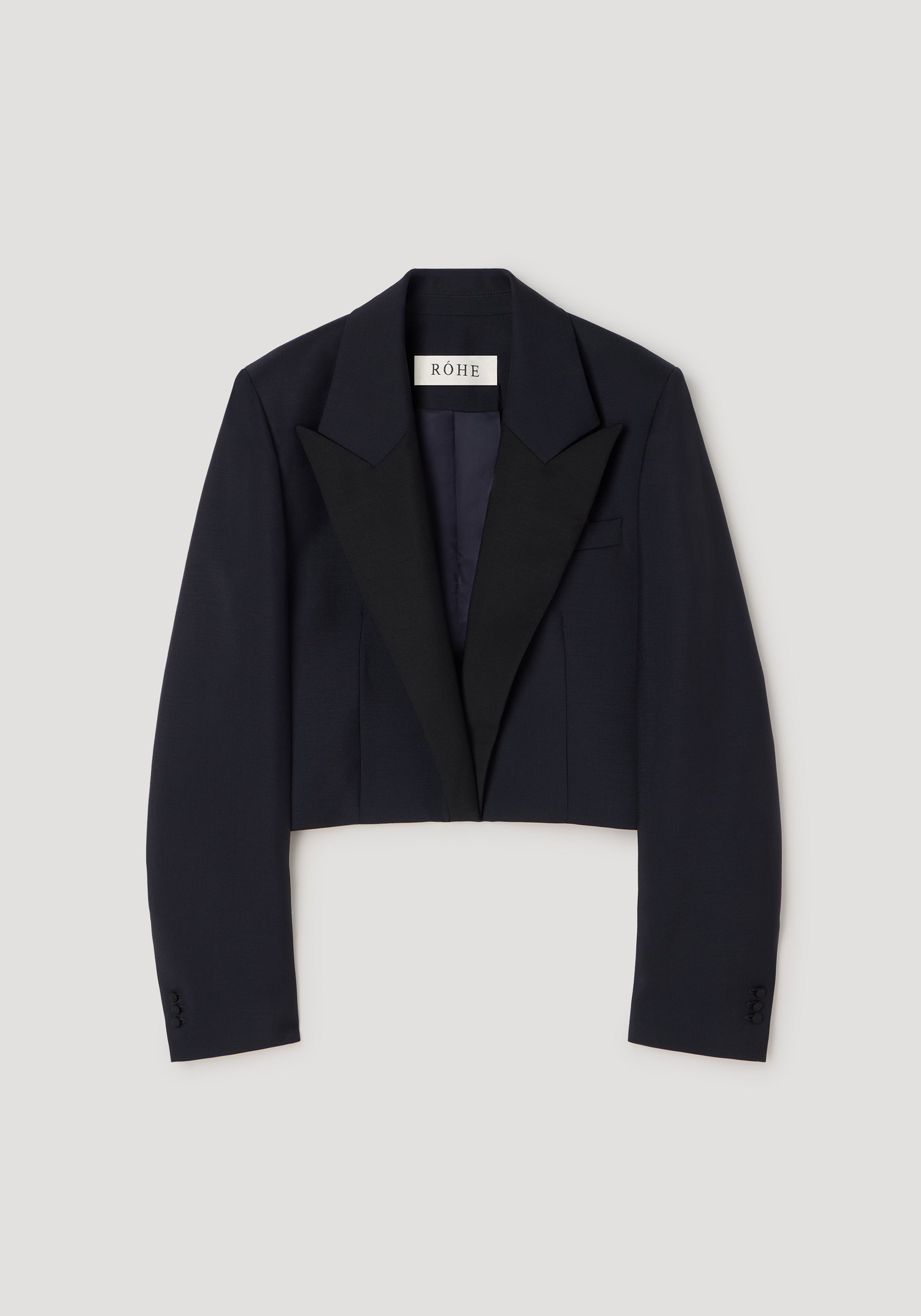 Cropped blazer | navy with a tailored fit, long sleeves, and a lapel collar, designed for a stylish and modern silhouette.