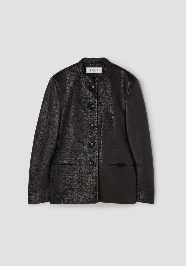 Shaped grain leather jacket | black with a textured finish, featuring a stand collar, five front buttons, and two side pockets, laid flat on a light background.