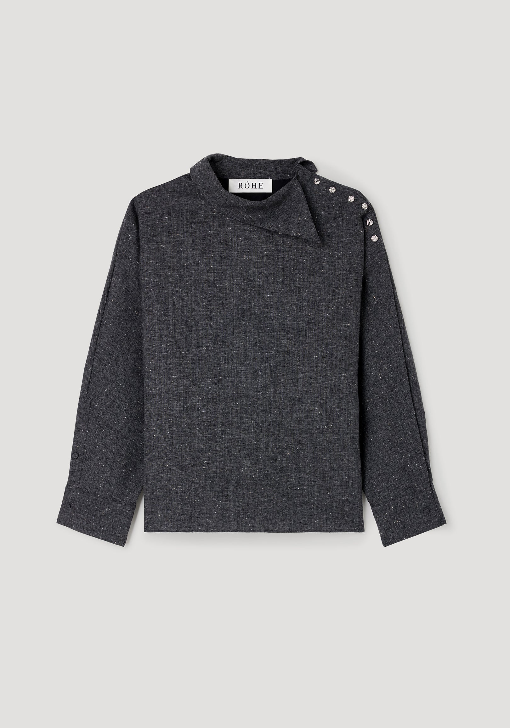 Reimagined collar top | grey slub with long sleeves, asymmetrical buttoned collar, and subtle textured fabric, laid flat on a light background.