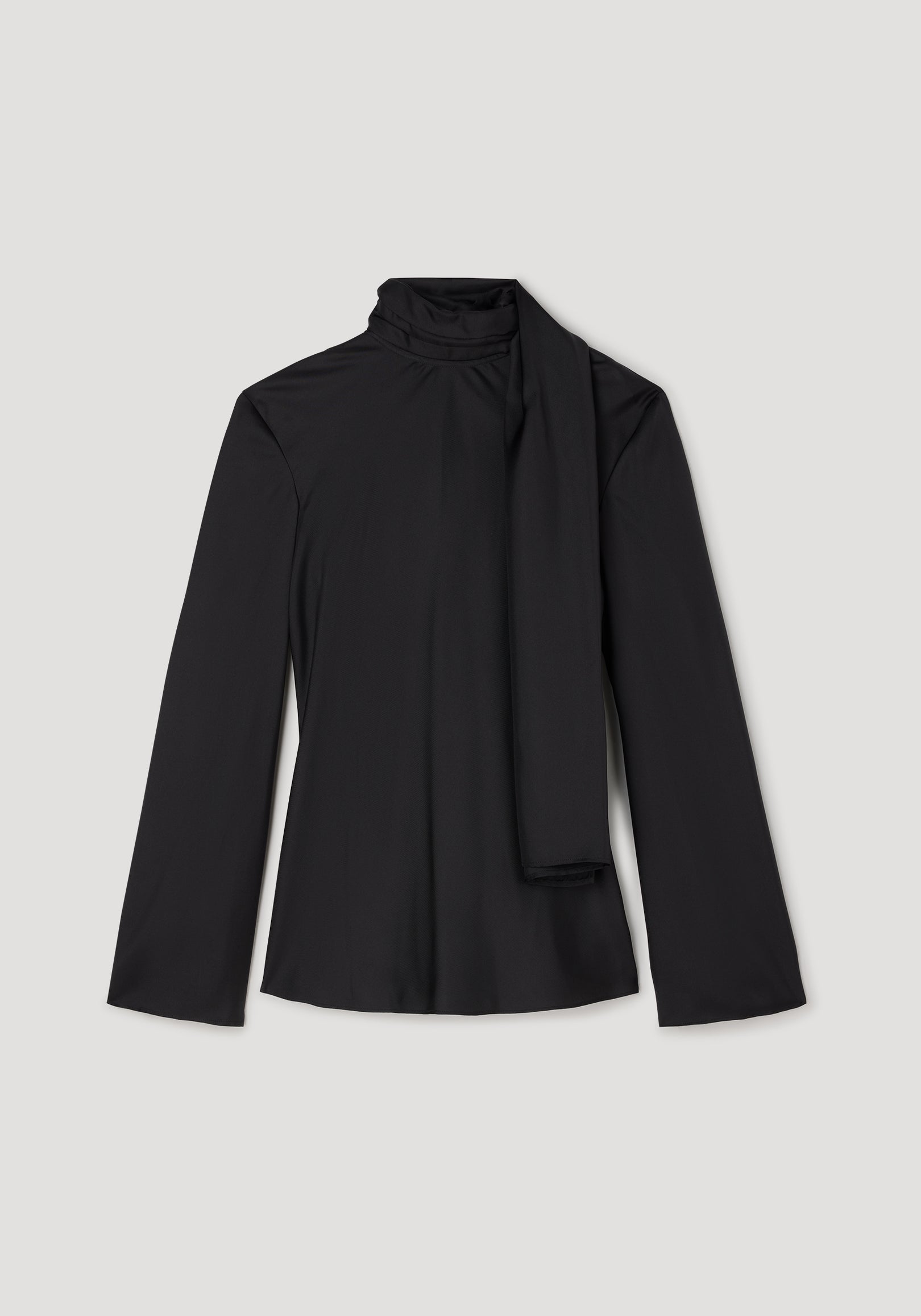 Silk foulard top | black with long sleeves and a high neck featuring an elegant attached scarf detail, displayed on a neutral background.