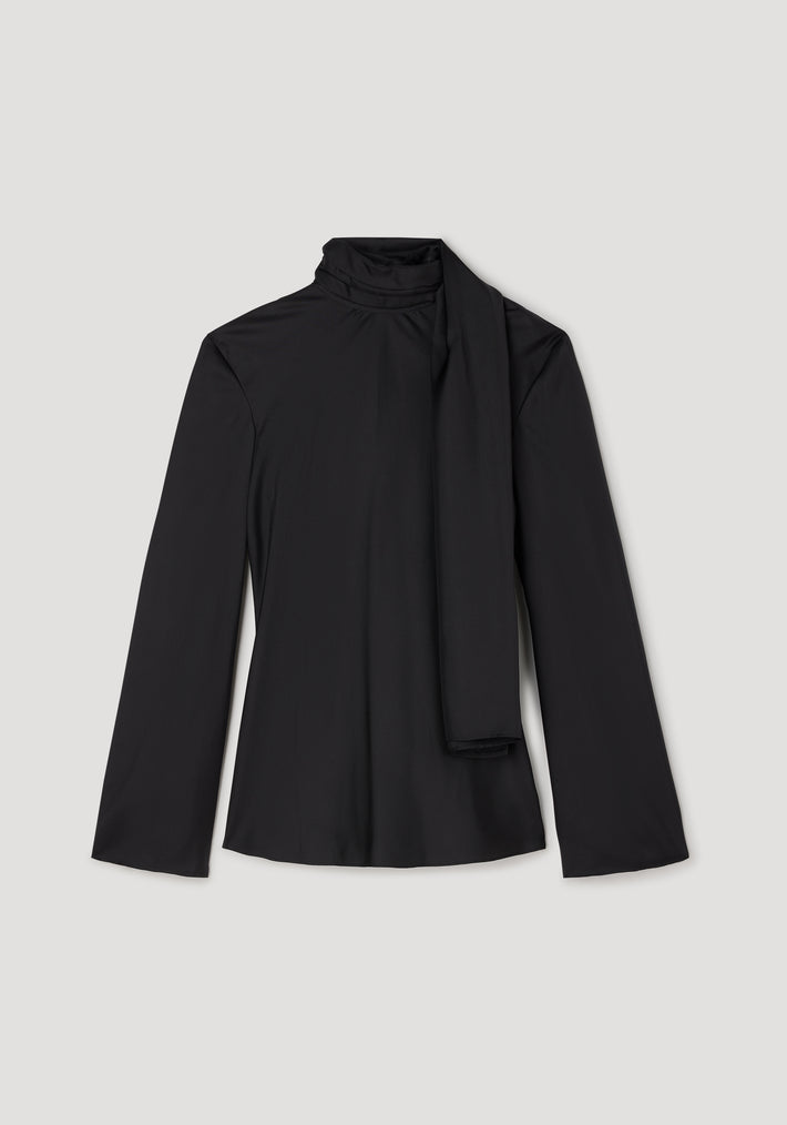 Silk foulard top | black with long sleeves and a high neck featuring an elegant attached scarf detail, displayed on a neutral background.