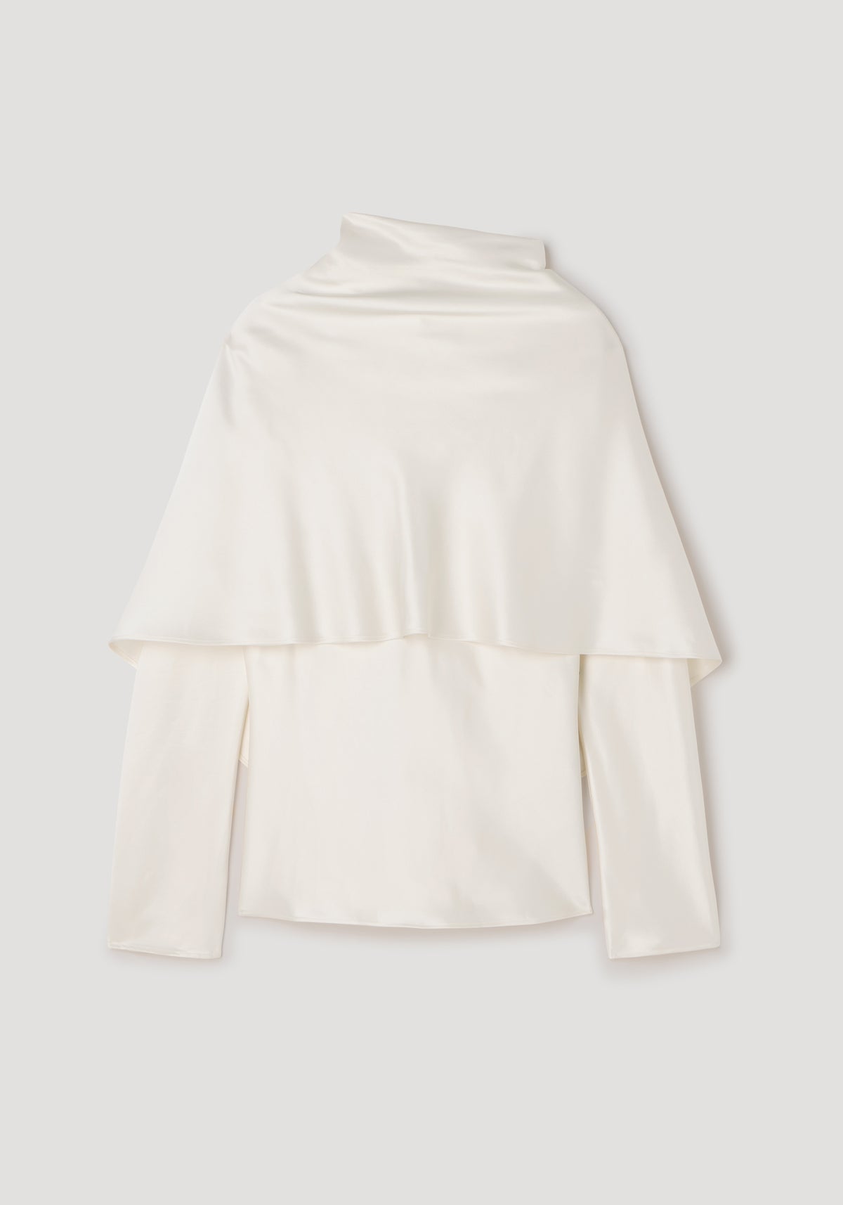 Satin cape top | cream in a smooth, flowing fabric with long sleeves and a high neckline, featuring an elegant cape detail draping over the shoulders.
