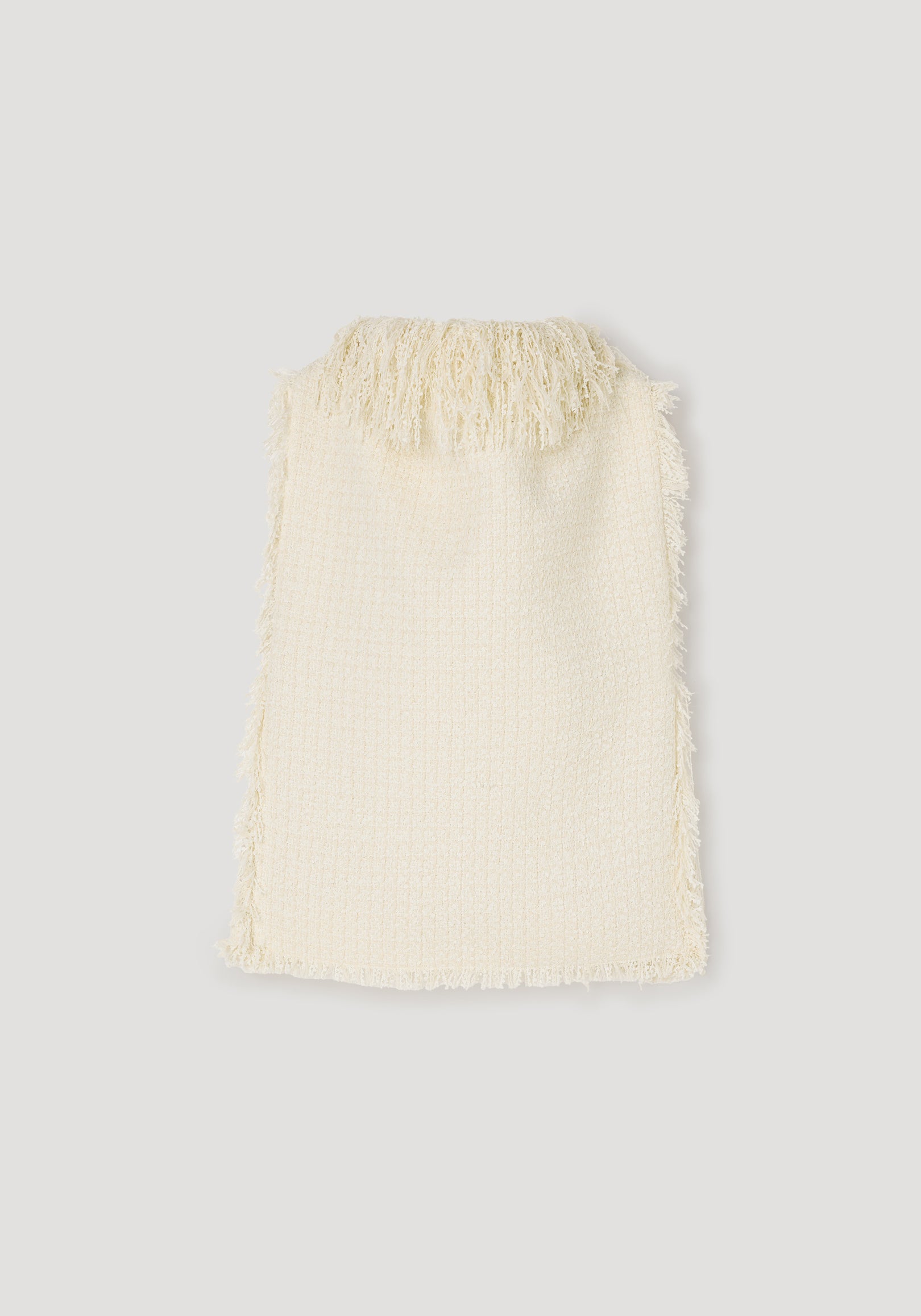 Cream-colored textured fringe bouclé top | cream laid flat displaying soft fabric with fringed edges and a high neckline fringe detail.