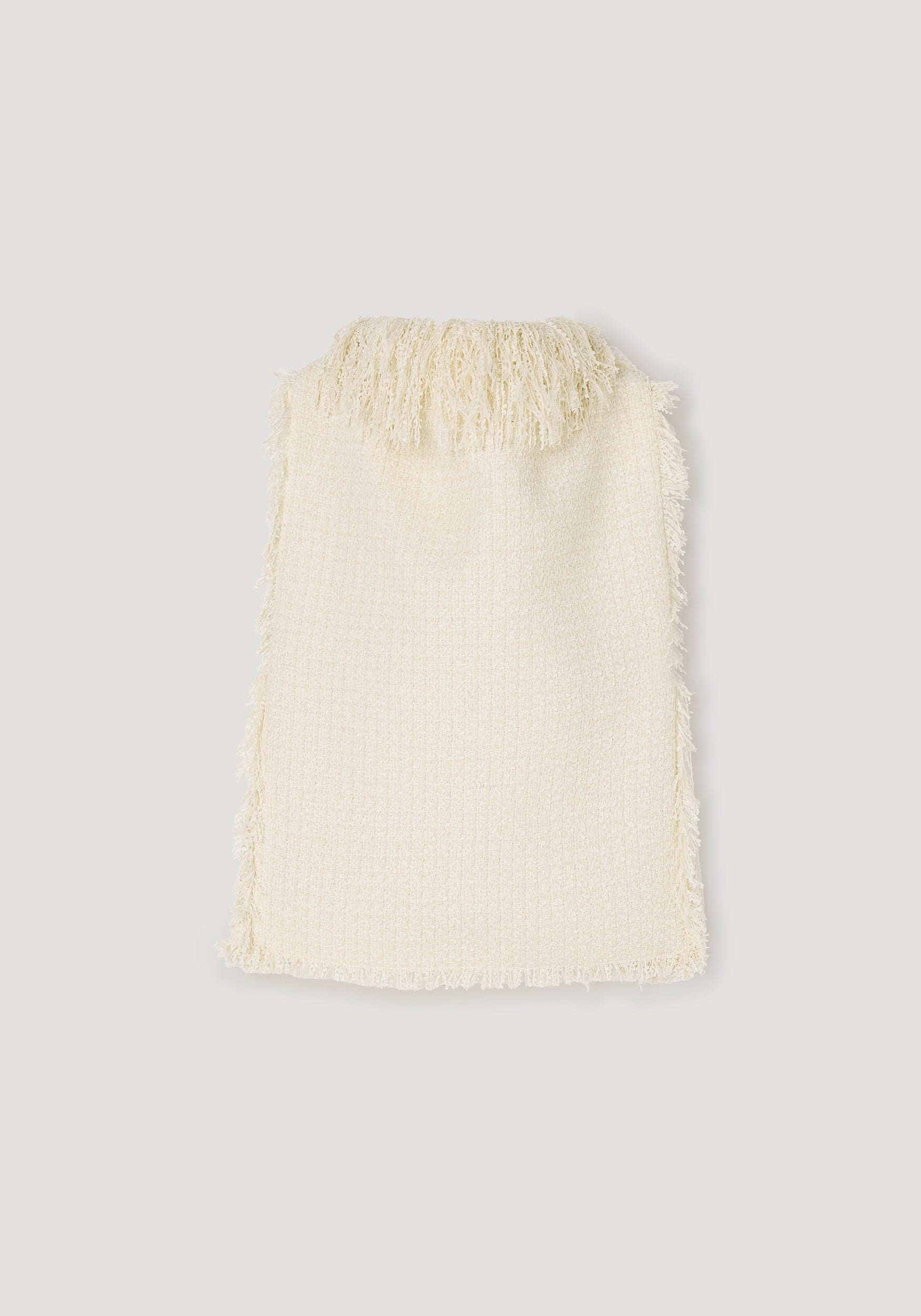 Cream-colored textured fringe bouclé top | cream laid flat displaying soft fabric with fringed edges and a high neckline fringe detail.