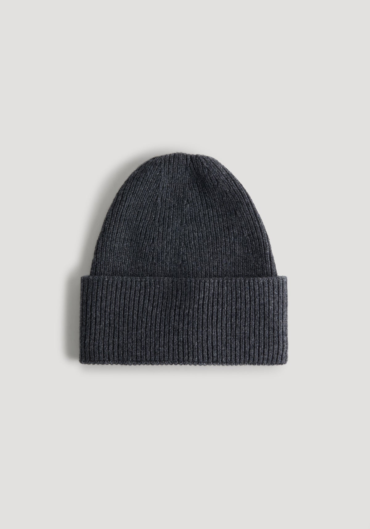 Beanie | anthracite melange displayed on a plain light background, showing a ribbed knit texture and folded cuff in a dark gray shade.