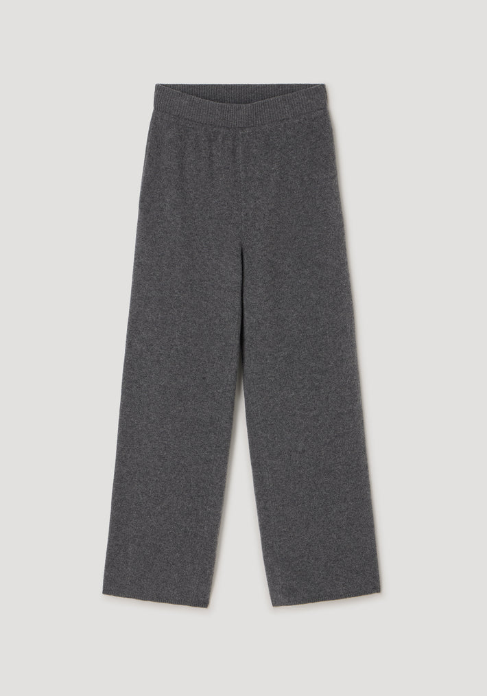 Compact knitted trousers | dark grey melange laid flat on a light background, featuring a wide-leg cut and elastic waistband for comfortable wear.
