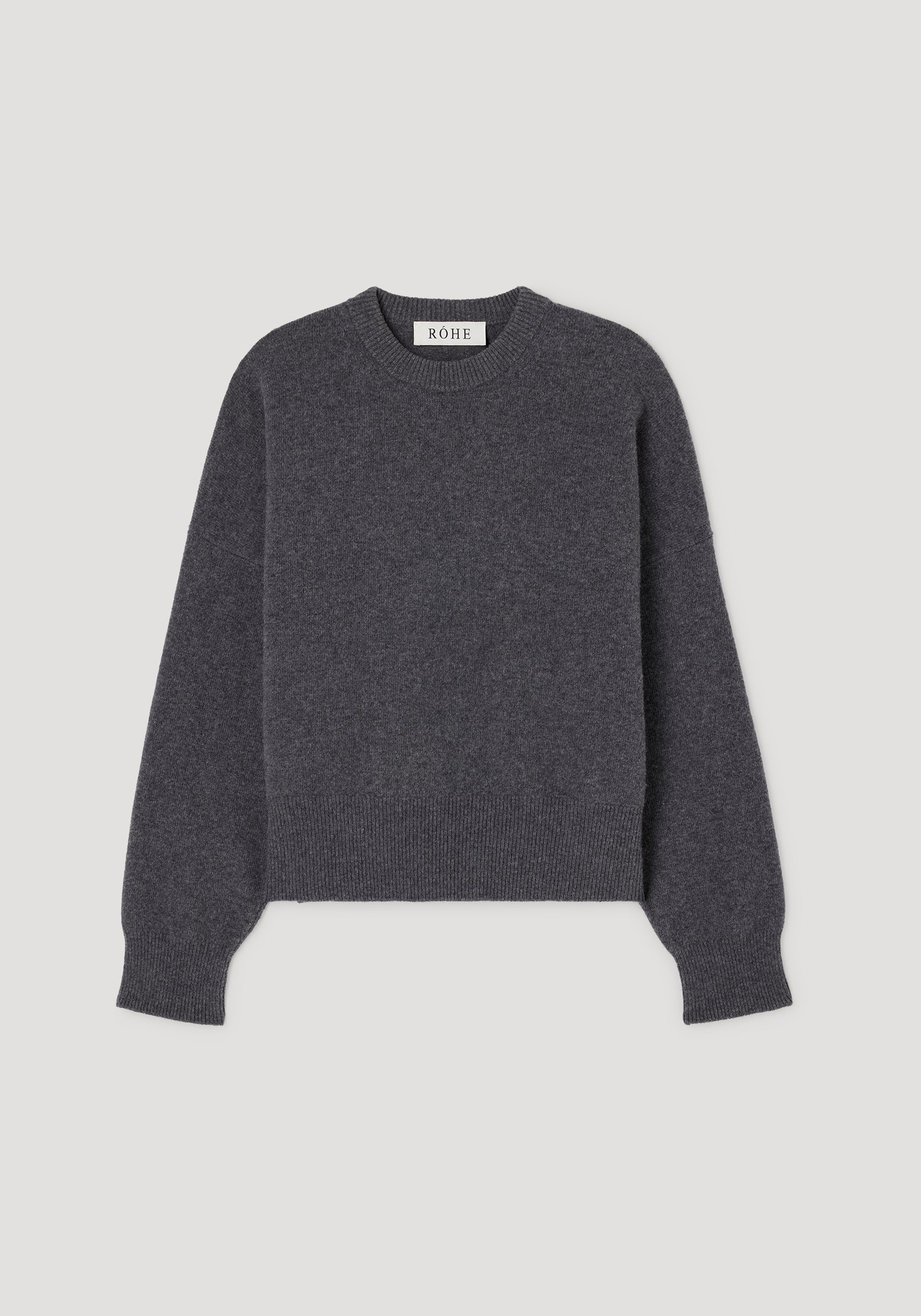 Classic crewneck jumper | dark grey melange with long sleeves and ribbed cuffs, hem, and neckline displayed on a flat surface.