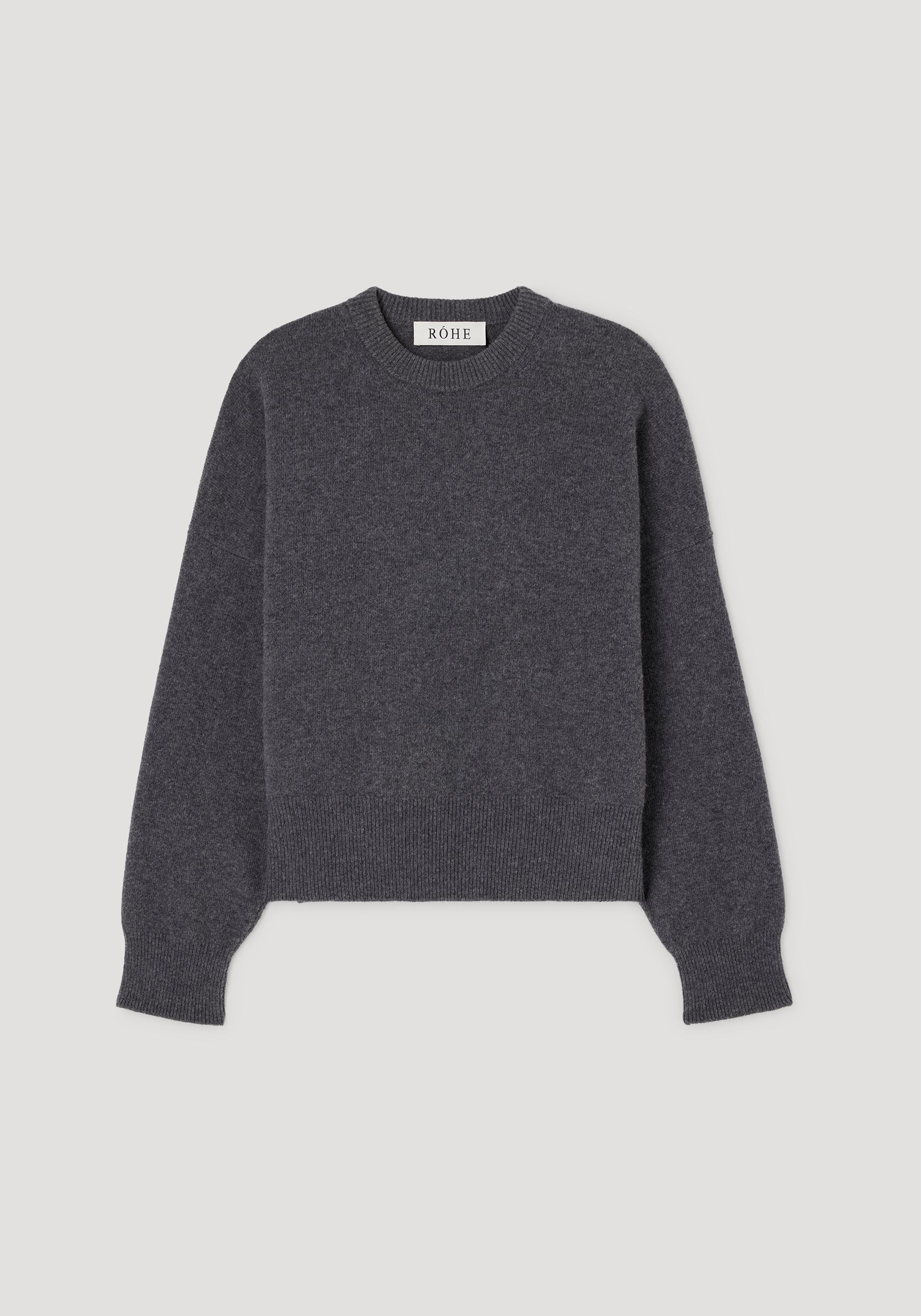Classic crewneck jumper | dark grey melange with long sleeves and ribbed cuffs, hem, and neckline displayed on a flat surface.