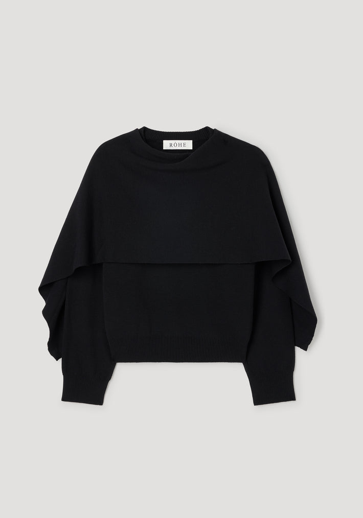 Cape jumper | black displayed flat on a light background, featuring a layered design with wide, loose sleeves and a ribbed hem.
