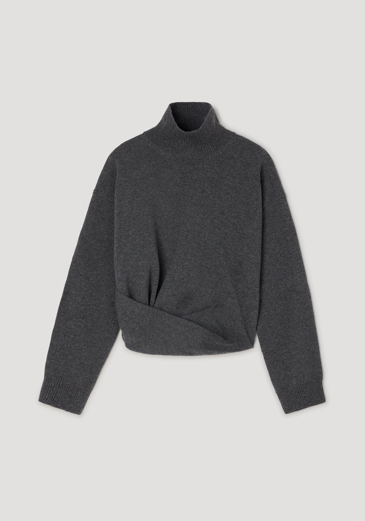 Sculptural turtleneck | dark grey melange sweater with long sleeves and a fitted, twisted hem design displayed on a neutral background.