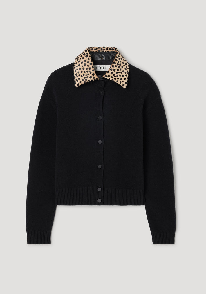 Cheetah collar cardigan | black featuring a solid black knit body with a contrasting beige cheetah print collar and front button closure.