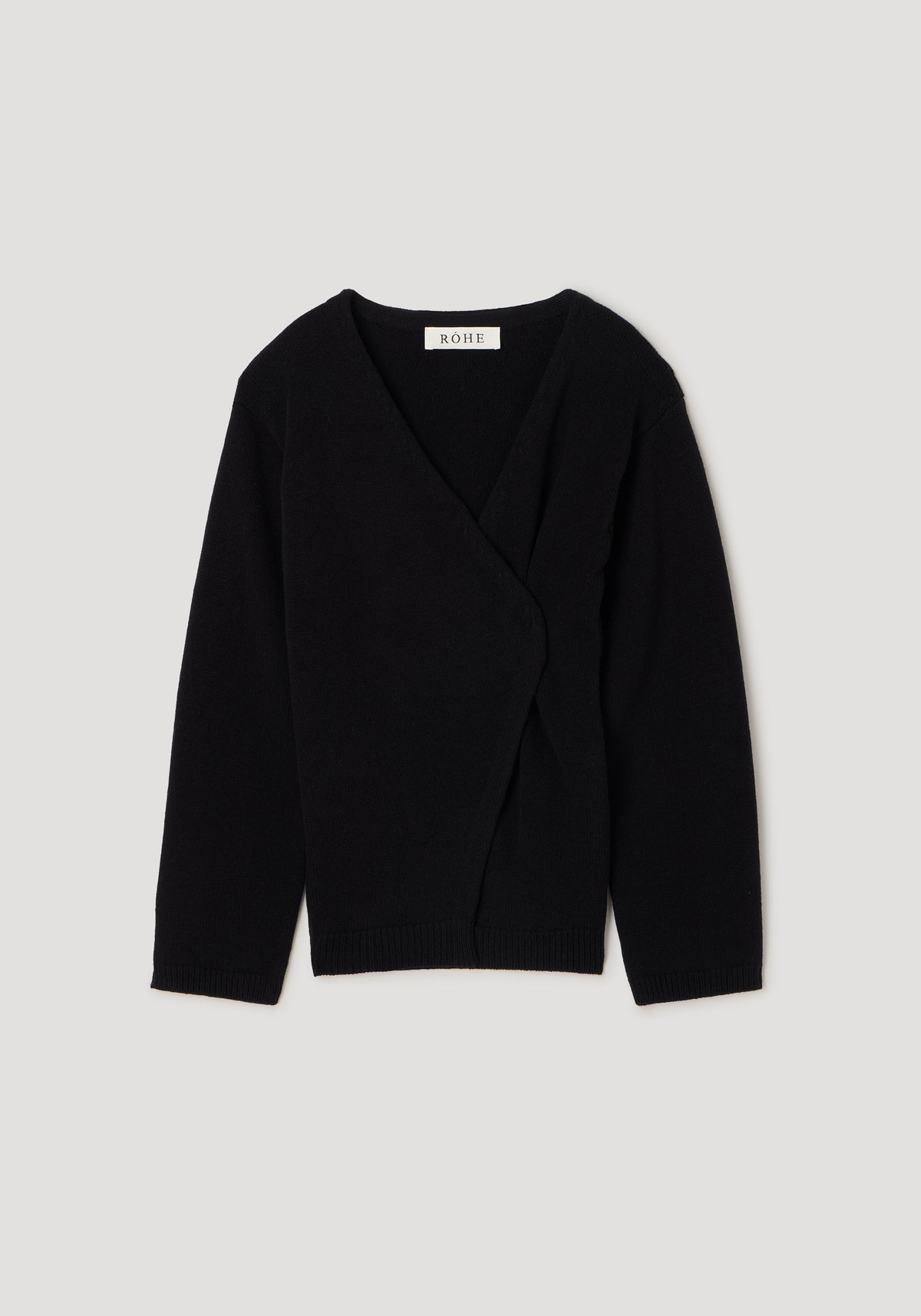 Black knitted off-shoulder wrap cardigan with long sleeves and a V-neckline, designed for a stylish and comfortable fit, labeled as Off-shoulder wrap cardigan | black.