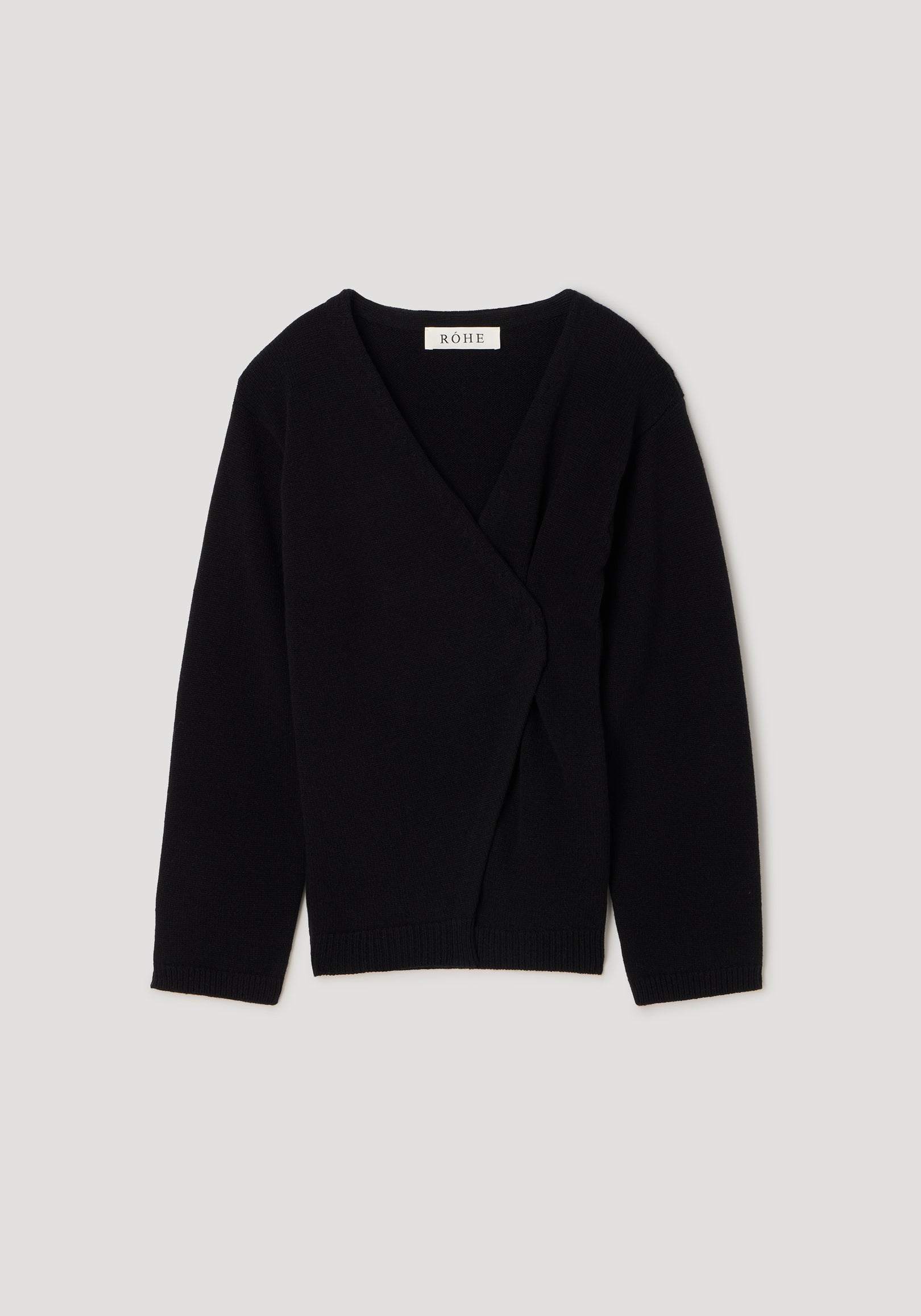 Black knitted off-shoulder wrap cardigan with long sleeves and a V-neckline, designed for a stylish and comfortable fit, labeled as Off-shoulder wrap cardigan | black.
