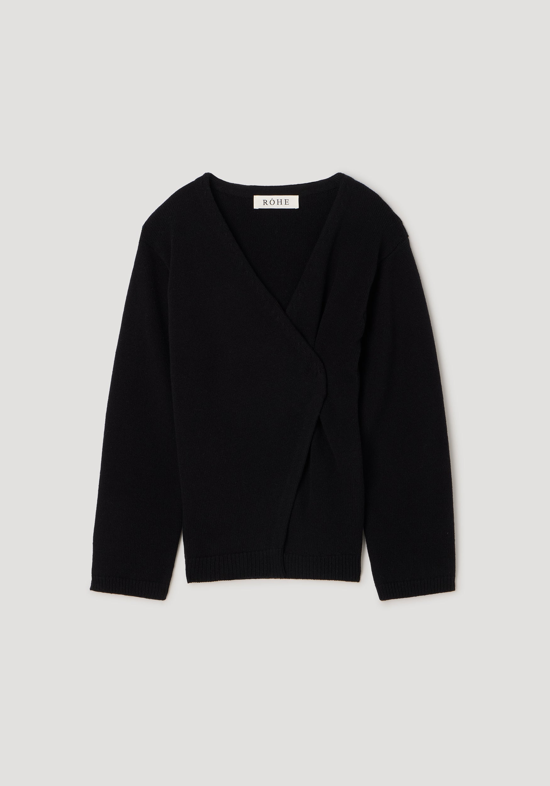 Black knitted off-shoulder wrap cardigan with long sleeves and a V-neckline, designed for a stylish and comfortable fit, labeled as Off-shoulder wrap cardigan | black.