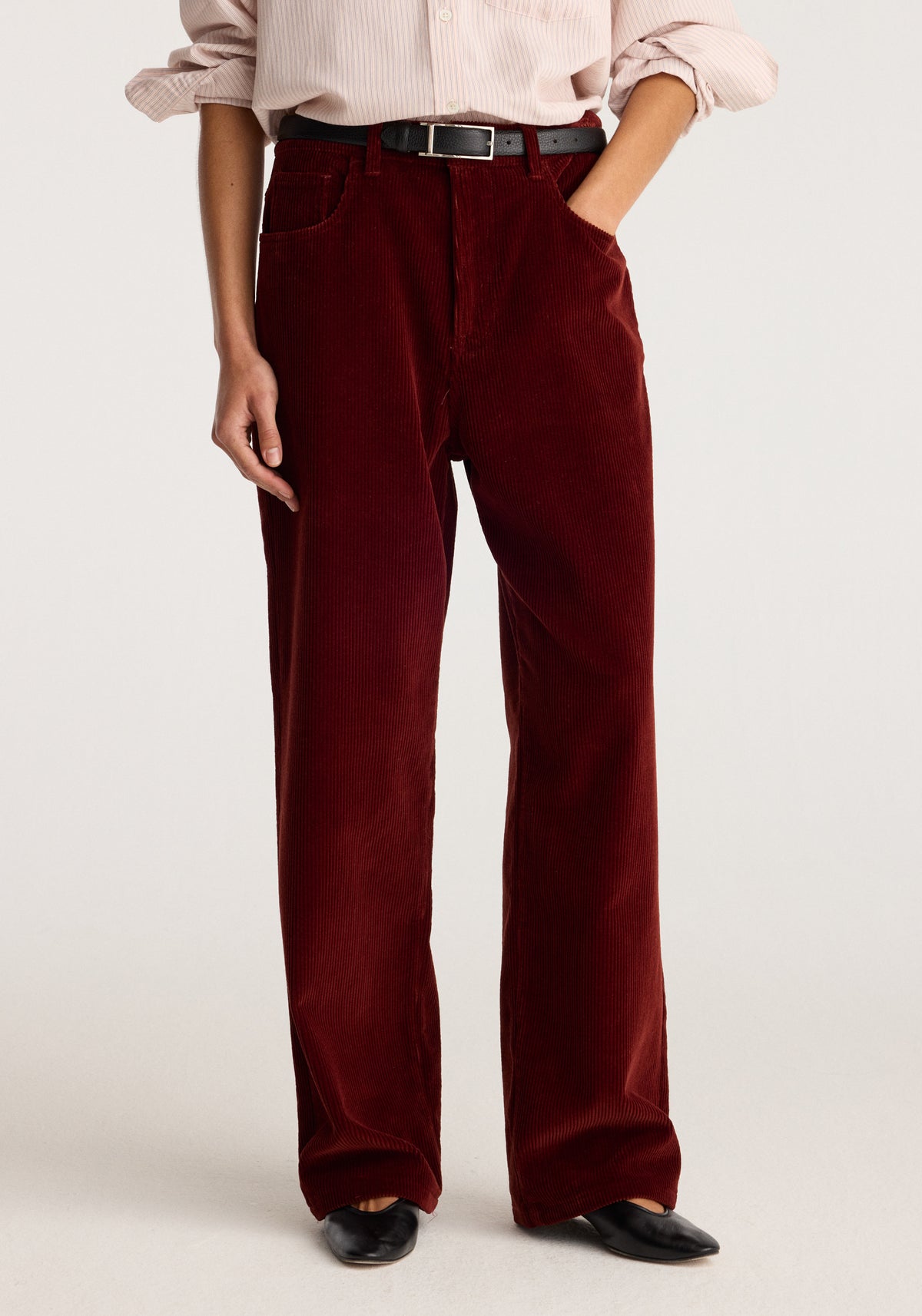 Bruun - Signature baggy corduroy trousers | wine shown on a model with wide legs belt loops and black shoes