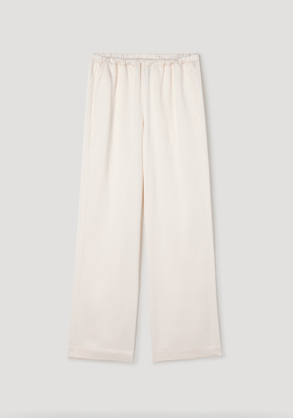 Relaxed fit satin trousers | cream in a soft cream color with an elastic waistband and wide leg design, made from smooth satin fabric for comfortable and stylish wear.