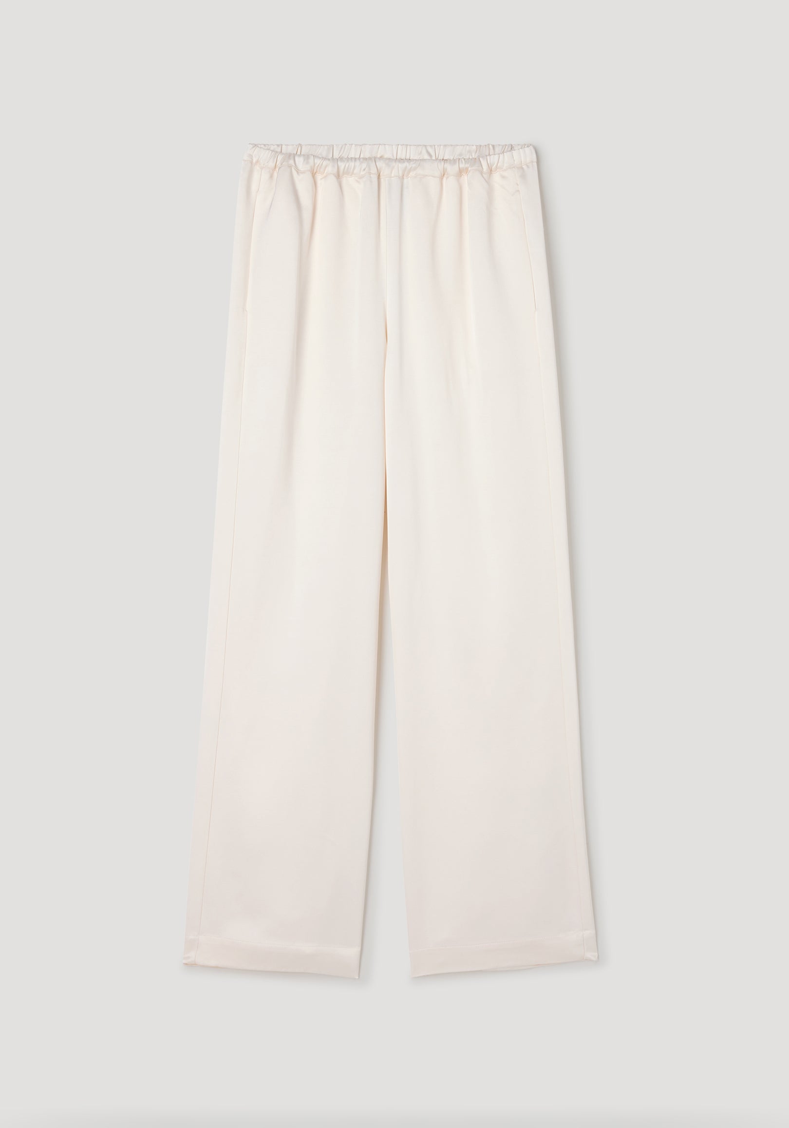 Relaxed fit satin trousers | cream in a soft cream color with an elastic waistband and wide leg design, made from smooth satin fabric for comfortable and stylish wear.