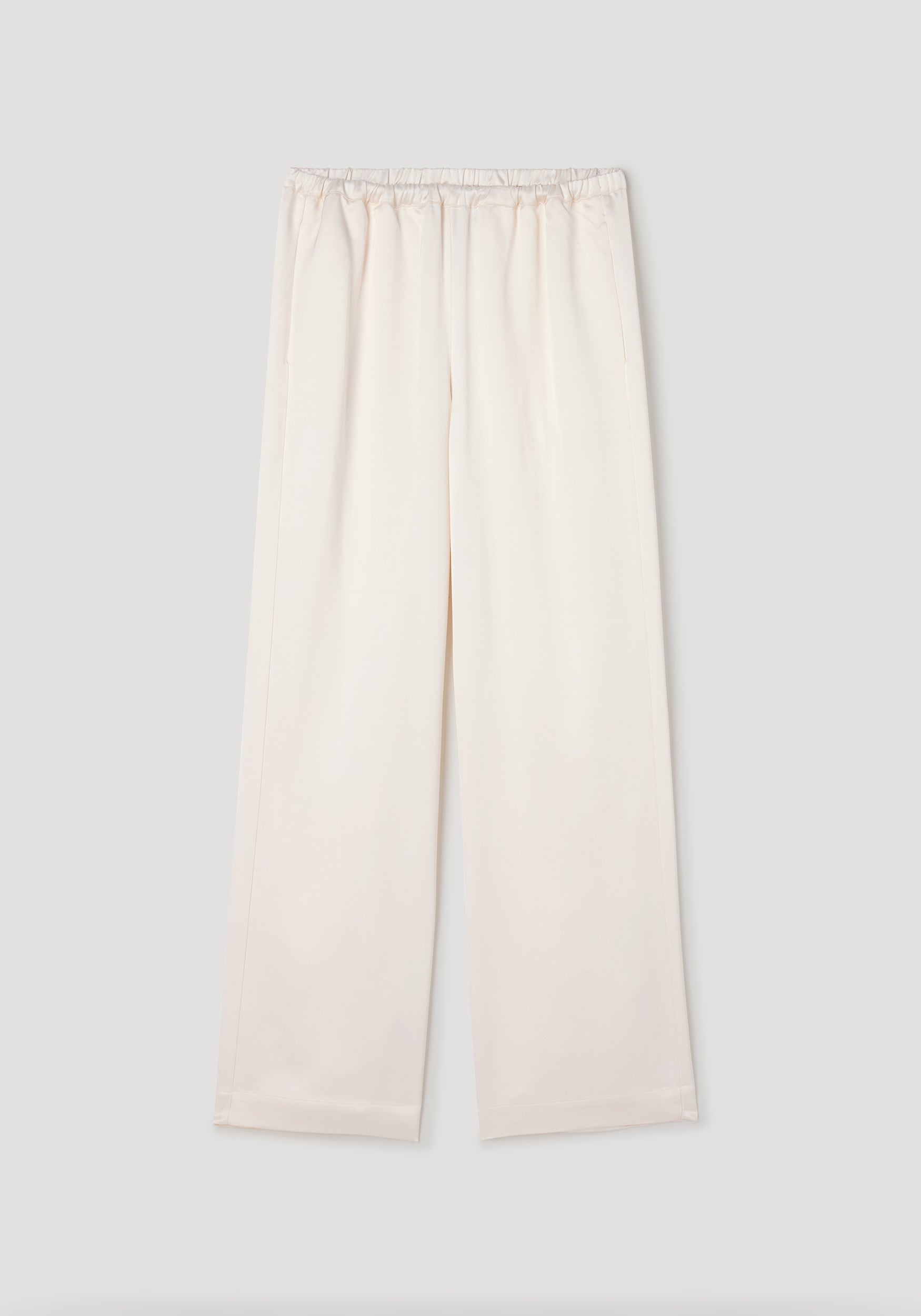 Relaxed fit satin trousers | cream in a soft cream color with an elastic waistband and wide leg design, made from smooth satin fabric for comfortable and stylish wear.