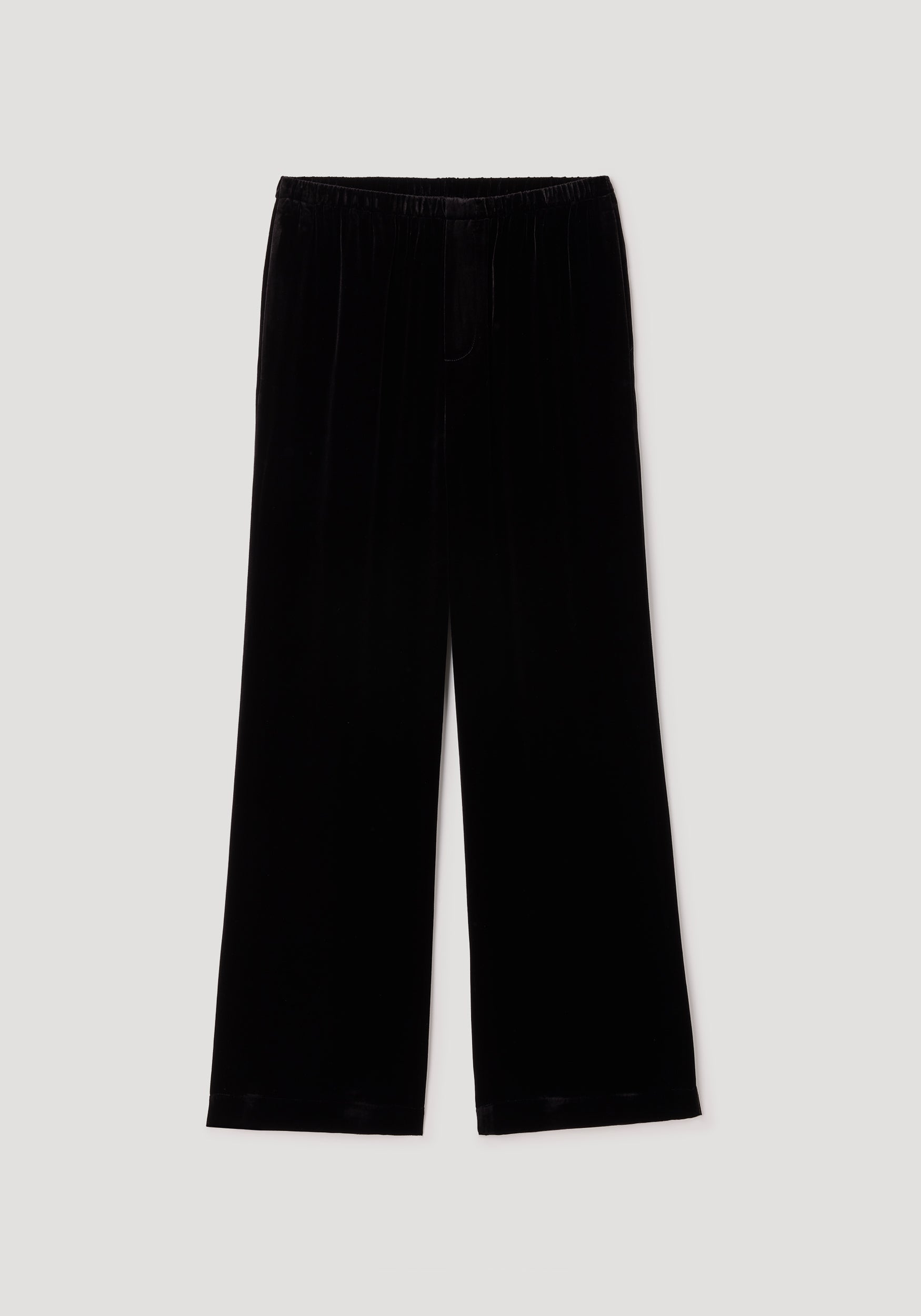 Velvet relaxed trousers | black displayed against a plain background, featuring a loose fit with a soft velvet texture and an elastic waistband for comfort.