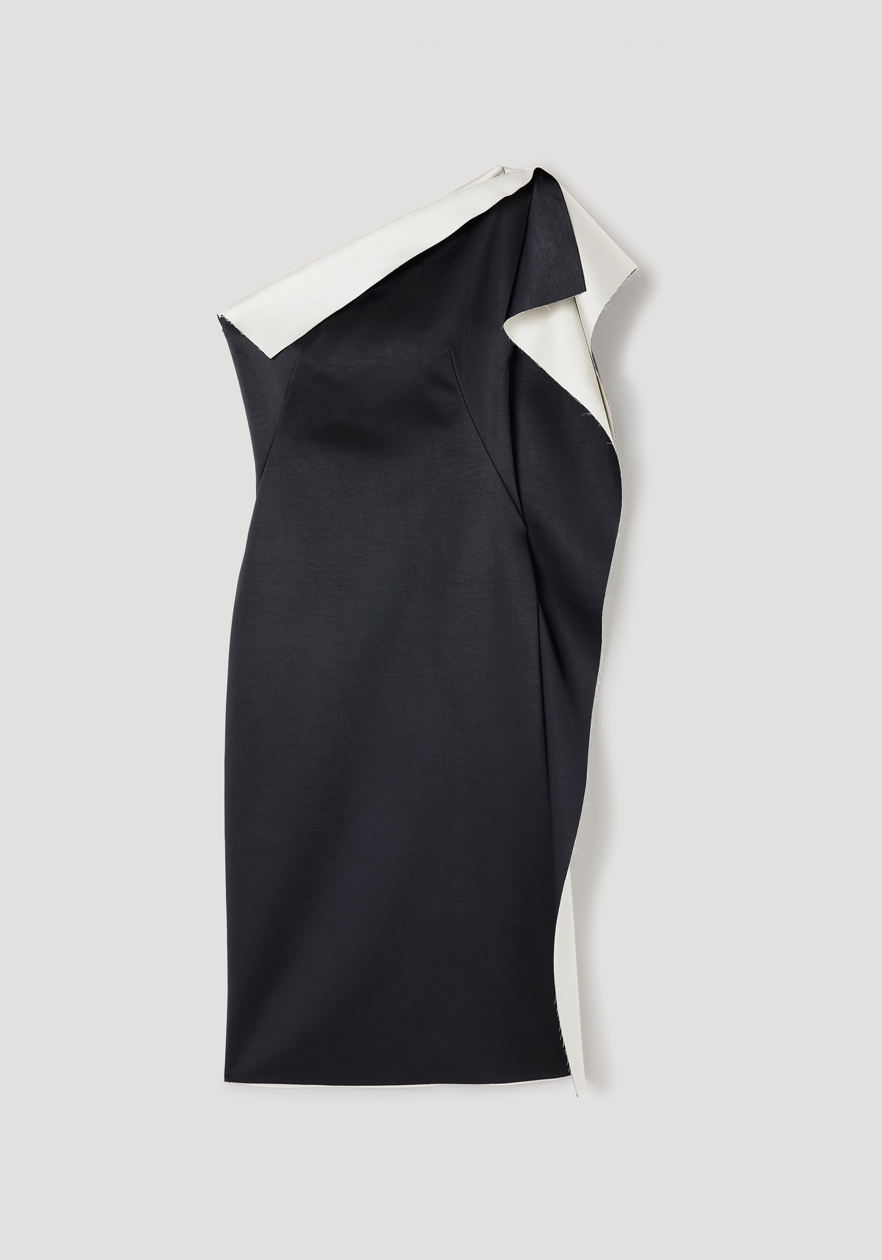 Sleek and elegant Sculptural double-satin off-shoulder dress | black/white featuring a modern asymmetrical neckline and smooth satin fabric with contrasting black and white tones.