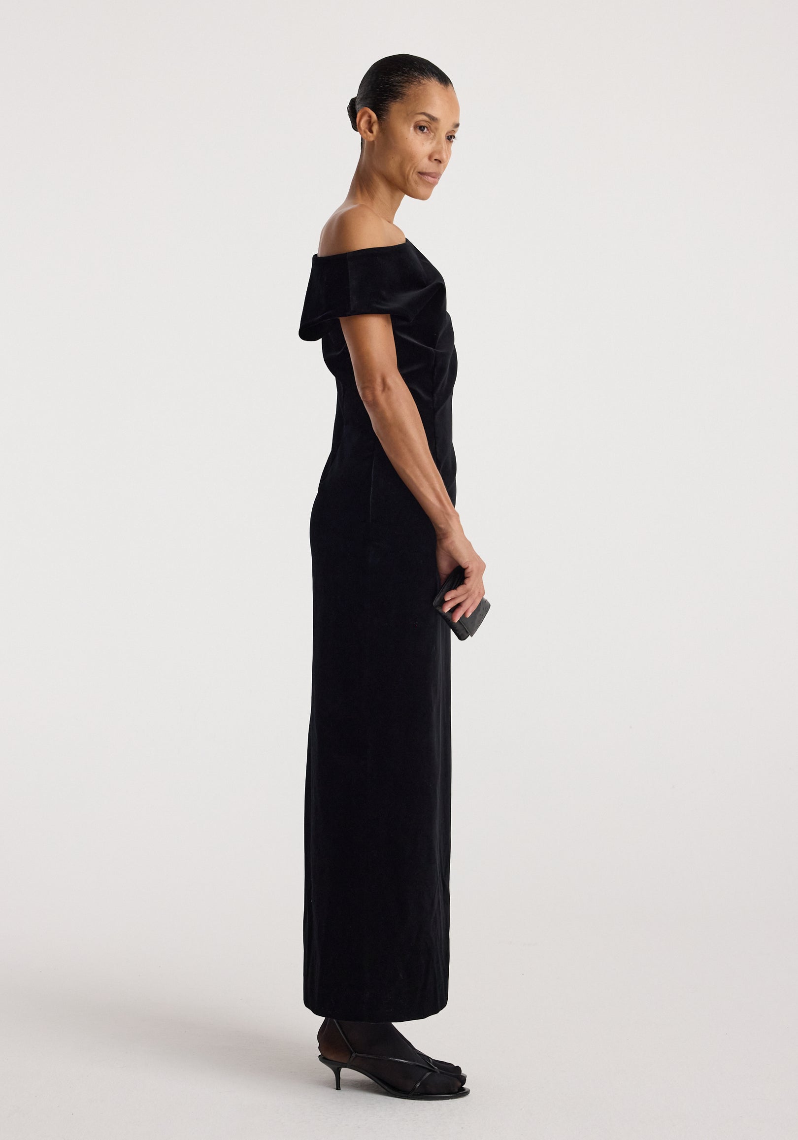 Sculptural off-shoulder velvet gown | black