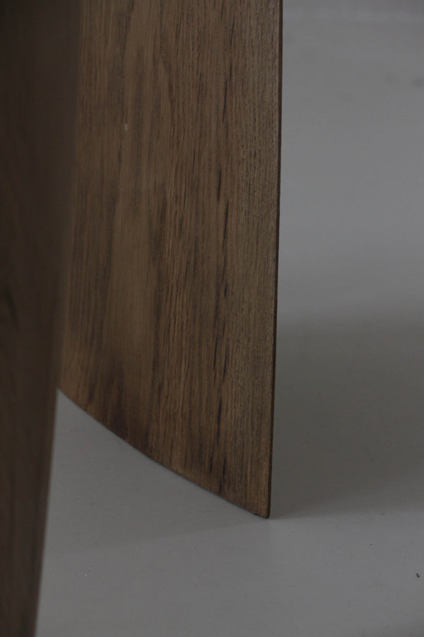Sculpted Stool | 4673: Close-up of two vertical oak panels, one in focus, showcasing the handcrafted, biophilic design by Arne Kristian.