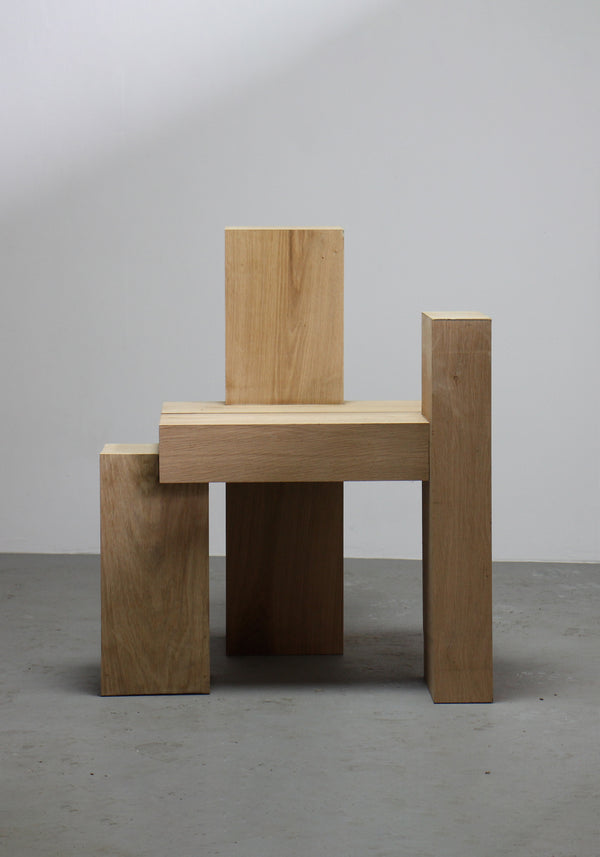 Cubistic Chair | 7365: An abstract, minimalist chair composed of solid oak blocks, handcrafted in the Netherlands by Arne Kristian, showcasing a unique cubistic design.