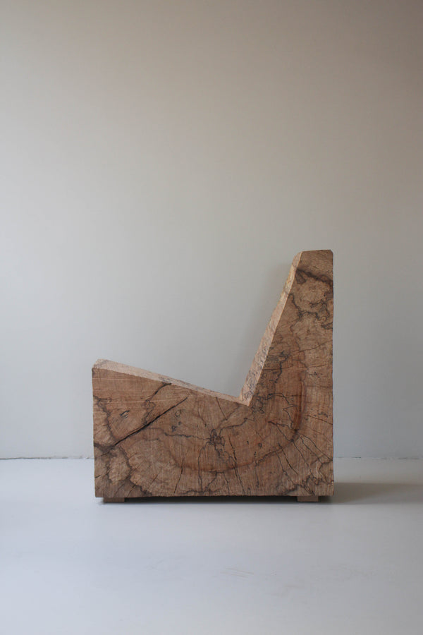 Brutalist Chair | 5788: L-shaped spalted oak wood block with visible saw cuts, handcrafted by Arne Kristian, showcasing minimal design and natural grain texture.