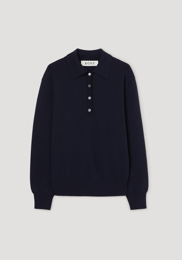 Merino wool polo | navy laid flat, showcasing a structured collar, three-button front, and visible RŌHE label on the collar, made from soft merino wool.