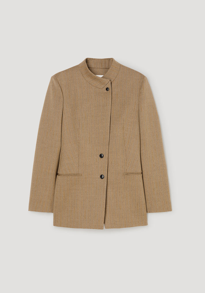 Overlap lapel blazer | heritage stripe in light brown with subtle vertical stripes, featuring a high collar, three black buttons, and two front pockets for a tailored and elegant look.