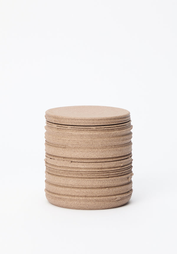 Diplomatico Scented Candle: Cork-colored discs stacked, each lid serves as a sage-burning coaster, housing a candle in a handmade ceramic vessel by Alex Gabriels.