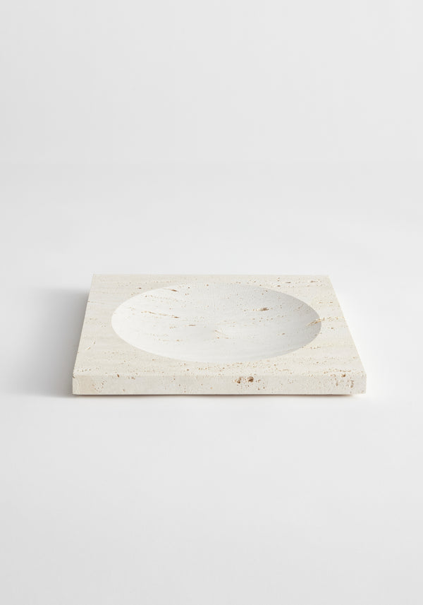 Medium tray | travertine: A square travertine slab with a round indent, handcrafted by Louis Crombag, measuring 26cm x 26cm, showcasing minimalist design.