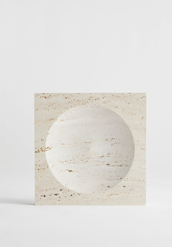 Medium tray | travertine: A handcrafted square tray with a circular indent, made from natural Italian travertine, showcasing unique pits and veins.